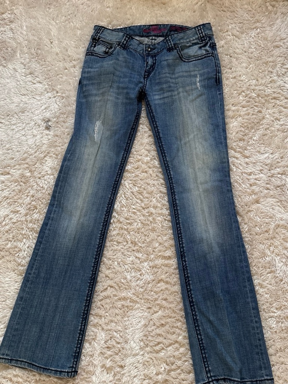Women’s Blue Boot Cut Jeans with Subtle Distressing